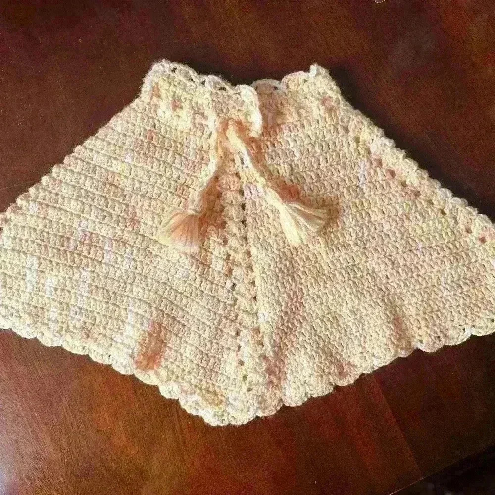 Crocheted pink,white, orange handmade infant poncho one size